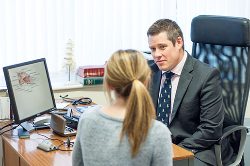 Mr Machin with a patient